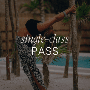 Person stretching outdoors by a pool.
